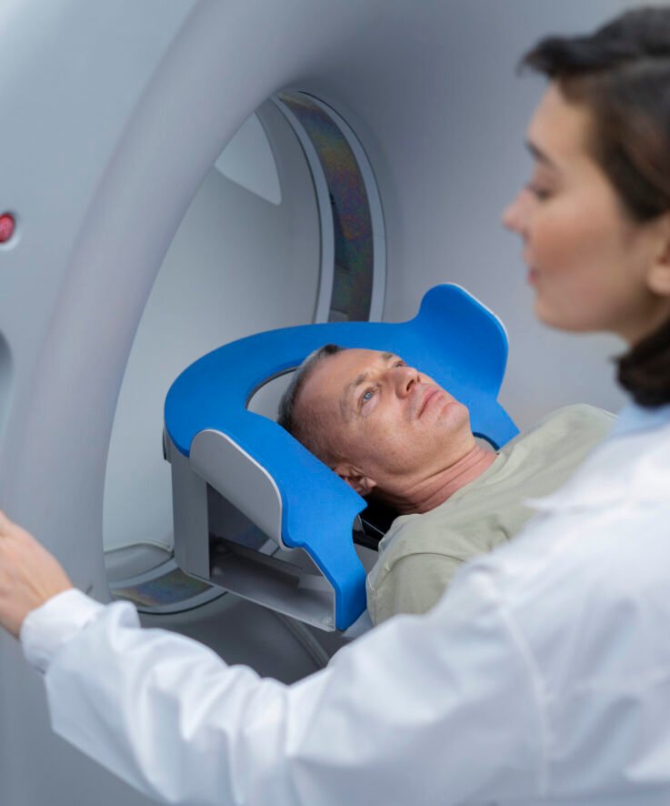 doctor-getting-patient-ready-ct-scan